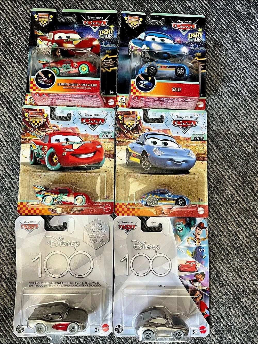 Disney cars lightning McQueen and sally race to celebrate, light up and 100